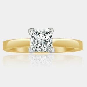 Handmade princess cut diamond engagement ring with 18ct white gold V-claw setting and 18ct yellow gold band.