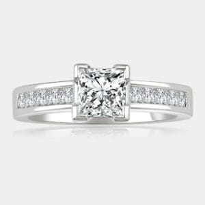 0.60 carat Princess cut diamond ring with princess cut shoulder diamonds set in 18ct white gold.