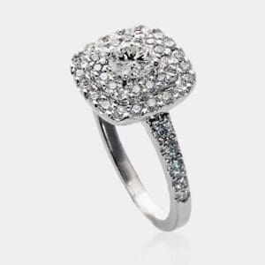 Handmade double halo engagement ring with round brilliant cut diamonds in 18ct white gold.